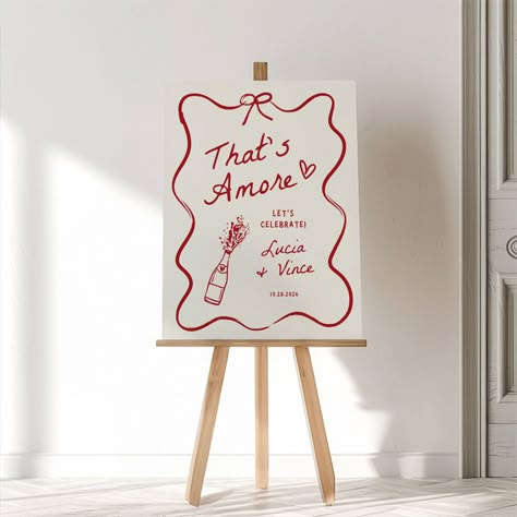 Welcome your guests with charm using our "That's Amore" Engagement Party Welcome Sign! This Canva template features a whimsical, wavy hand-drawn design, adding a touch of romance and fun to your celebration. Easily customizable to fit your unique style, it sets the perfect tone for an unforgettable engagement party. Perfect for couples who want to celebrate their love with a playful and stylish touch! 𝗧𝗛𝗔𝗧'𝗦 𝗔𝗠𝗢𝗥𝗘 𝗕𝗨𝗡𝗗𝗟𝗘: https://www.etsy.com/ca/listing/1792741823/thats-amore-bri Italian Theme Balloon Garland, Table Setting Engagement Party, Thats Amore Sign, Love At First Swipe Engagement Party, Italian Engagement Party Decorations, Woodsy Engagement Party, Pink And Green Engagement Party, Red Welcome Sign, Galentines Party Theme