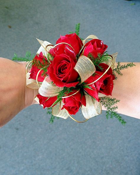 Red Spray Rose Corsage With Gold Wire Accents Rainbow's End Floral www.rainbowsendfloral.com Red And Gold Corsage And Boutonniere, Red And Gold Boutonniere, Red Rose Corsage And Boutonniere, Red And Gold Corsage, Red Corsage Prom, Red Prom Corsage, Red Corsage And Boutonniere, Prom Corsage Red, Red Wrist Corsage