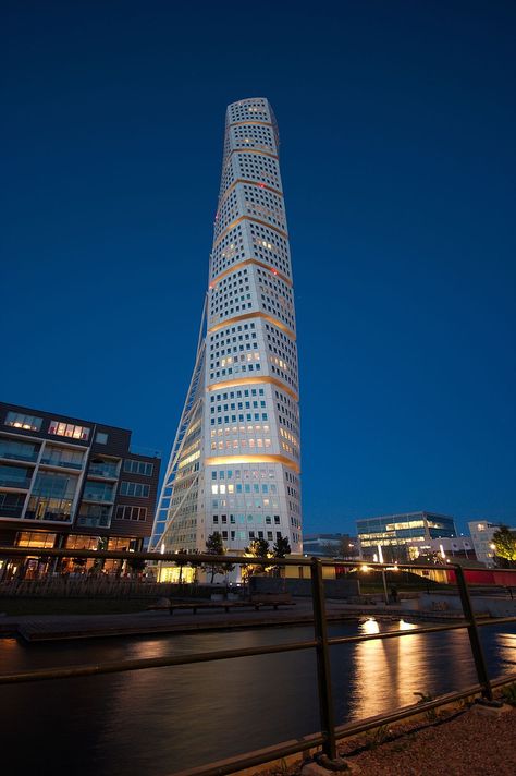 HSB Turning Torso is the tallest skyscraper in Sweden and the Nordic countries, situated in Malmö, Sweden on the Swedish side of the Öresund strait. Since completion, it is the tallest building in Scandinavia. Turning Torso, Malmo Sweden, Copenhagen Travel, Sweden Travel, Scandinavian Countries, Santiago Calatrava, Nordic Countries, Amazing Buildings, Unique Buildings