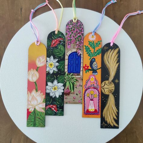 📚✨ Exciting News for bibliophile! We’re launching our brand new collection of hand-painted bookmarks, each a piece of art inspired by unique themes! Dive into the magic of: 🎨 Lily Pond 🚪The Blue Door 🪷 Lotus Magic 🎨 Indian Traditional Art ⚡ Harry Potter Quidditch Ball Each bookmark features a motivational quote on the back, perfect for adding a touch of inspiration to your reading journey. Available now for sale—DM for prices and make your reading experience even more enchanting! #handpa... Ganesh Bookmark, Lotus Bookmark, Lotus Gouache Painting, Indian Bookmarks, Flower Bookmark Painting, Harry Potter Quidditch, Lily Pond, Blue Door, Exciting News