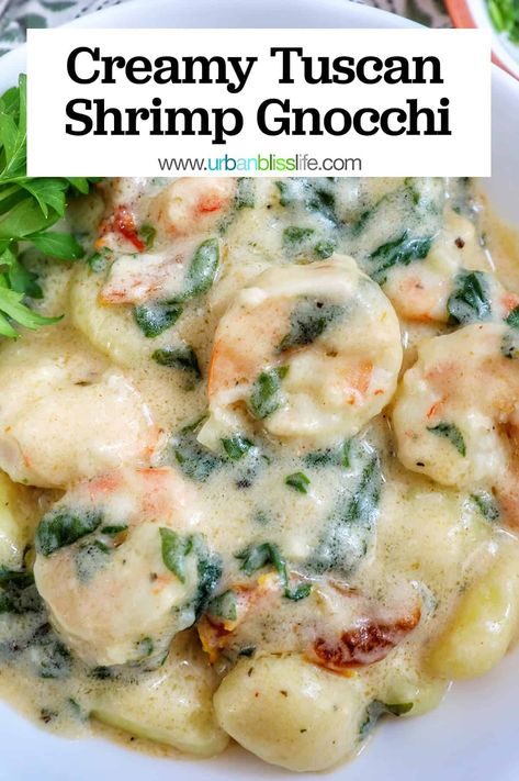 This creamy Tuscan shrimp gnocchi is a warm, comforting seafood pasta recipe that's easy to make in 30 minutes. Get the easy recipe at UrbanBlissLife.com. Shrimp Gnocchi, Creamy Tuscan Shrimp, Gnocchi Recipes Easy, Tuscan Shrimp, Gnocchi Dishes, Seafood Dish Recipes, Seafood Pasta Recipes, Shrimp Recipes For Dinner, Shrimp Recipes Easy