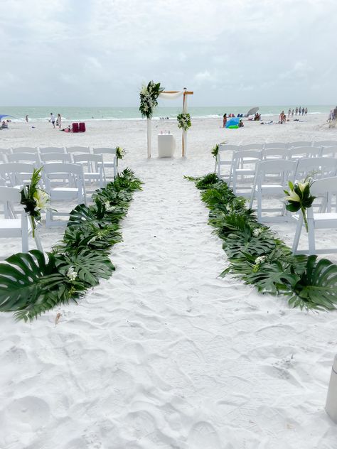 Wedding Isles Decoration Beach, Tropical Wedding Ceremony Aisle, Palm Leaf Wedding Aisle, Beach Wedding Aisle Ideas, Beach Wedding Altar, Beach Wedding Aisle Decor, Beach Wedding Aisle, Destination Wedding Centerpieces, Wedding Aisle Decorations Outdoor