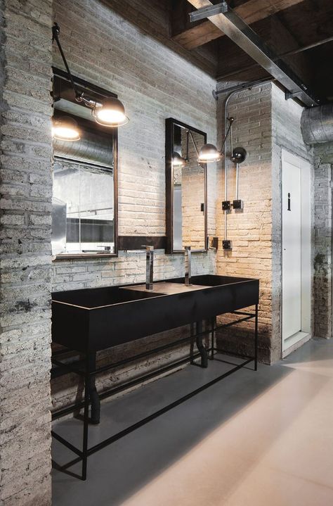 Industrial Office Features Exposed Bricks & Concrete Ceilings<span class="wtr-time-wrap after-title"><span class="wtr-time-number">2</span> min read</span> Vintage Industrial Bathroom, Industrial Bathroom Decor, Brick Bathroom, Industrial Bathroom Design, Urban Industrial Decor, Industrial Chic Decor, Industrial Style Interior, Dining Room Industrial, Industrial Style Bathroom