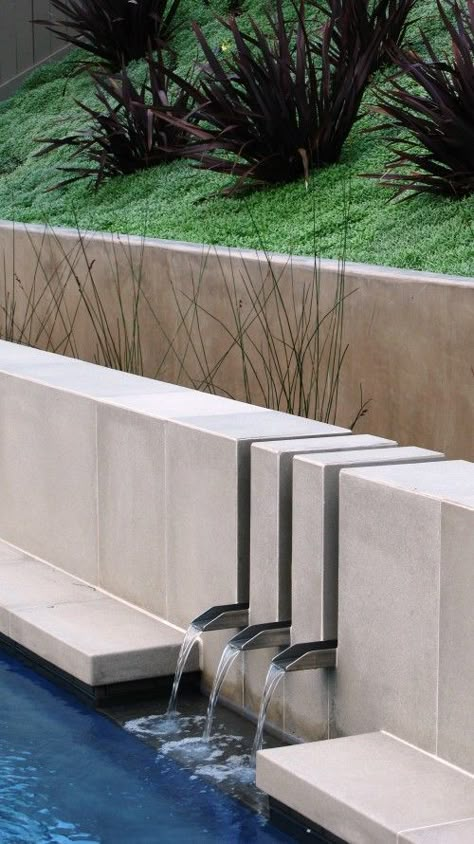 I like the water feature detail idea...the stainless steal scuppers are neat. Pool Retaining Wall, Patio Fountain, Contemporary Landscape Design, Kolam Koi, Taman Air, Concrete Retaining Walls, Garden Water Feature, Pool Water Features, Water Spout