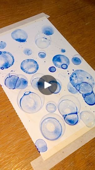 5.7K views · 159 reactions | My favorite thing about art is that there are no rules 🫧🧼🛁  Steps to painting with bubbles: Mix desired watercolor shade with liquid soap and a bit of water. The consistency should be more viscous than just watercolor itself but not so thick that a paintbrush does not easily move the liquid around. Next, use a straw (metal or glass because plastic is shit) and dip the tip in. Practice blowing bubbles on your pallets first which will help you gauge your breath. If you want clean bubbles with no splatter, put a drop of water on the paper and then blow a bubble onto the drop. If you don’t care about them popping and creating a splatter texture then blow the bubble straight onto the paper. Some will pop and some wont. Experiment with the ratio of soap to water t Watercolor Bubbles Painting, Painting With Bubbles, Bubble Video, Bubble Drawing, A Drop Of Water, There Are No Rules, Bubble Painting, Drop Of Water, Raw Color