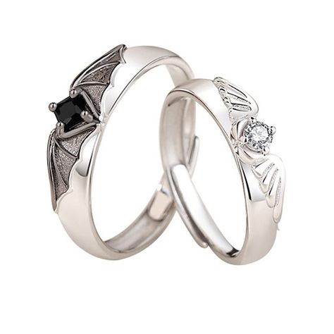 PRICES MAY VARY. DESIGN -- This gothic couples rings is designed by angel and devil wings. The opening of the ring is adjustable. The white symbolizes the angel and the black symbolizes the devil. ADJUSTABLE SIZE --- Devil and angel couple rings has an adjustable function, Fairly easy to resize,Very flexible, easy to put on or take off, suitable for most people to wear. MATERIAL --- Copper+zircon. Angel and devil rings are made of high-quality copper material. The copper material is easy to adju Adjustable Wedding Rings, Vintage Wedding Rings Sets His And Hers, Cool Promise Rings, Masc Ring, Promise Rings For Couples Matching Set, Promise Rings For Her Girlfriends, Matching Rings Aesthetic, Cute Matching Rings, Gothic Wedding Bands