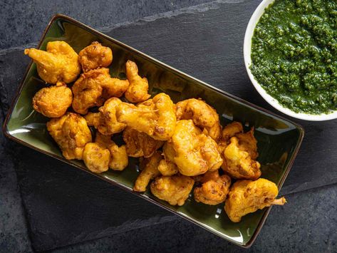 Cauliflower Pakoras Recipe Cauliflower Pakora, Pakoras Recipe, Chicken Fried Steak, Popular Snacks, Chaat Masala, Different Vegetables, Serious Eats, Sweet Sauce, Tikka Masala