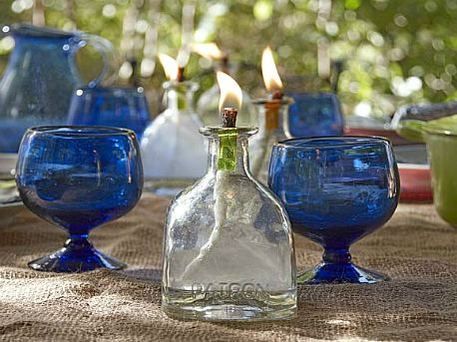 Upcycle a Glass Bottle into an Oil Lantern - great for centerpieces! Patron Bottles, Patron Bottle, Oil Lantern, How To Make Oil, Tequila Bottles, Tiki Torches, Wedding Lanterns, Diy Candle, Diy Oils