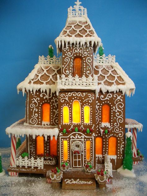 Victorian Gingerbread Mansion - This years gingerbread mansion is decorated with royal icing fences and rock candy trees! The windows are made of melted butterscotch candies. Gingerbread House Ideas, Gingerbread Art, Gingerbread Creations, Cool Gingerbread Houses, Gingerbread House Template, Make A Gingerbread House, Gingerbread House Designs, All Things Gingerbread, Gingerbread House Cookies