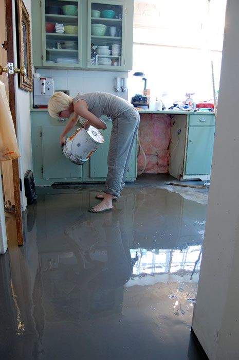 I was TERRIFIED to pour self levelling cement over my kitchen floor but after reading a ton about it online I did it. And it worked GREAT. Tutorial here. Cement Floor Diy, Self Leveling Concrete, Self Leveling Floor, Concrete Floors Diy, Cement Floor, Concrete Projects, Basement Flooring, Garage Gym, Basement Renovations