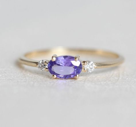 Opal And Tanzanite Ring, Oval Sapphire Ring With Gemstone Accents, Dainty Oval Sapphire Ring For Formal Occasions, Dainty Oval Sapphire Ring For Anniversary, Heirloom Oval Sapphire Ring With Gemstone Accents, Oval Tanzanite Sapphire Ring, Elegant Oval Sapphire Ring With Gemstone Accents, Oval Amethyst Ring For Wedding, Oval Sapphire Promise Ring With Gemstone Accents