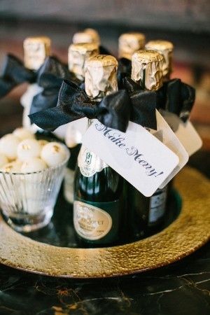 It also makes a good, festive wedding favor. | How To Throw The "Great Gatsby" Wedding Of Your Dreams White Winter Wedding, Mini Champagne Bottles, New Years Eve Weddings, Great Gatsby Wedding, Festive Wedding, Great Gatsby Party, Mini Champagne, בר מצווה, Winter Wedding Inspiration