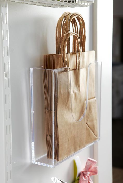 back-of-door-storage-paper-bags-24938e3c Kitchen Organization Ideas Dollar Store, Dollar Store Organizing Kitchen, Small Boutique Interior Design, Small Boutique Interior, Bag Storage Ideas, Interior Boutique, Butik Design, Kitchen Organization Ideas, Store Design Boutique