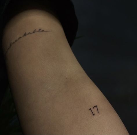 Number Tattoos On Arm, Tiny Tattoos Numbers, Single Number Tattoo, Fine Line Tattoo Numbers, Tattoo Numbers Fonts, 27 Tattoo Number, Minimal Tattoo Arm, 25 Tattoo Number, Number Tattoo Arm