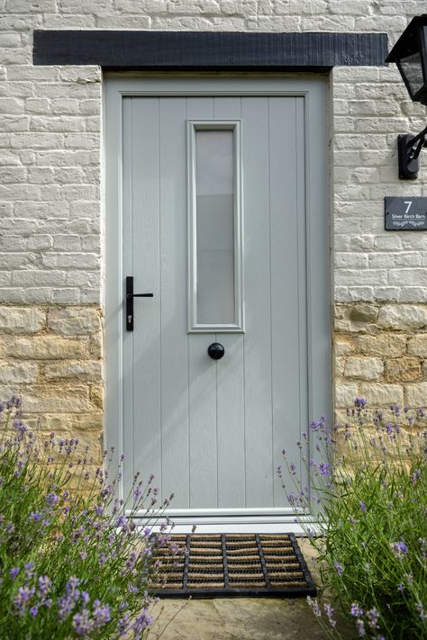 Swipe for interior - The Flint 4 design in Painswick from Solidor's Flint Cottage Range with a single glass panel and Black door hardware. Front Door Stone House, Painswick Front Door, Solidor Painswick, Modern Traditional Front Door, Pub Renovation, Composite Front Doors Uk, Flint Cottage, Front Doors With Glass Panels, Cottage Style Front Doors