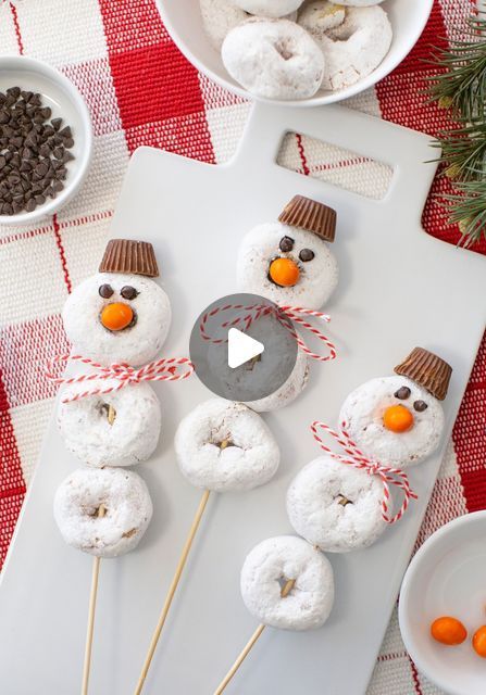 Melissa Johnson on Instagram: "FROSTY SNOWMAN DONUT SKEWERS ☃️❄️ Such a fun easy dessert to make for a holiday party with the kids! Stack three powdered donuts on a skewer. Top it off with a mini Reese's peanut butter cup. To bring Frosty to life, add an orange M&M peanut for his nose. Don't forget to give Frosty some eyes using mini chocolate chips. Add a drop of frosting to each mini chocolate chip to secure them. To complete the look, tie a festive scarf by using your favorite twine or ribbon. These adorable holiday treats are sure to bring joy to your celebrations. #frostythesnowman #kidsbaking #kidsdessert #christmasdessert #christmaspartyfood" Donut Skewers, Fun Easy Desserts, Snowman Donuts, Holiday Party Desserts, Snowman Treats, Reese's Peanut Butter Cup, Frosty Snowman, Powdered Donuts, Kid Desserts