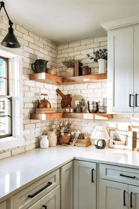 a cozy kitchen with a brick backsplash - DigsDigs Vintage Backsplash Kitchen Brick, Ivory Brick Backsplash Kitchen, Brick In Kitchen Accent Walls, White Brick Backsplash Kitchen, Kitchen Backsplash Brick, Kitchen Brick Backsplash, White Brick Kitchen, Corner Shelves Ideas, Brick Tiles Kitchen