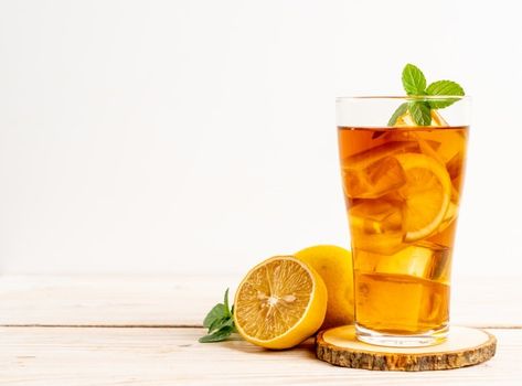 Glass of ice lemon tea Premium Photo | Premium Photo #Freepik #photo #food #water #table #fruit Es Lemon Tea, Es Lemon, Tea Advertisement, Refreshing Fruit Drinks, Ice Lemon Tea, Water Fruit, Cape Gooseberry, Liquid Sugar, Watermelon Ice