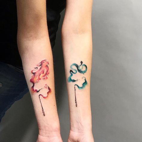 Harry Potter tattoo inspo from @gabi.cuni.tattoo. Click the link for more tattoos inspired by the Wizarding World ✨  #harrypotter #harrypottertattoo #tattooinspiration #tattoos #tattoo #watercolortattoo #hogwarts #hogwartstattoo #forearmtattoo #matchingtattoo #friendshiptattoo #colortattoo #Patronus #Patronustattoo Matching Harry Potter Tattoos, Ravenclaw Tattoo, Hufflepuff Tattoo, Expecto Patronum Tattoo, Patronus Tattoo, Patronus Harry Potter, Slytherin Tattoo, Harry Potter Tattoo Sleeve, Hogwarts Tattoo