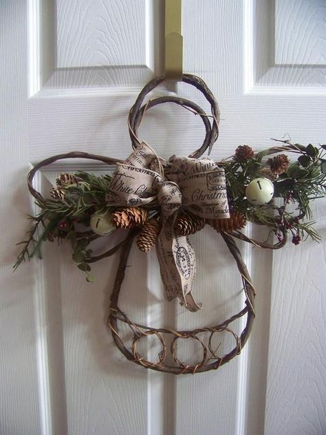 grapevine angel with subdued greens (artificial) white bells and a linen ribbon with Christmas print. 18inX18in lightweight I think I should take pictures on another colored door as the white vanished I am doing several in bright berries rusted bells and bright ribbon I think these have a Grapevine Angel, Colored Door, Grapevine Christmas, Christmas Stocking Ornament, Rustic Door, Linen Ribbon, Stocking Ornament, Rustic Doors, Christmas Angel