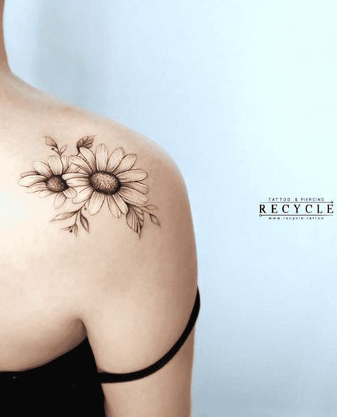 Gerbera Daisy Shoulder Tattoo, Daisy Tattoo Ideas For Women, Daisy Shoulder Cap Tattoo, Small Cluster Tattoos, Black And Gray Daisy Tattoo, Daisy Cluster Tattoo, Shoulder Daisy Tattoo, Daisy Foot Tattoos For Women, Shoulder Coverup Tattoos For Women