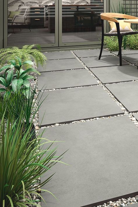 Take a look at this stylish, modern style idea for creating a ground design in your garden. Use some tiles in different colours and choose from among our range of decorative aggregates to complete the composition 🏡 Carport Tiles, Carport Patio, Decorative Aggregates, Ground Design, Tiles Ideas, Mediterranean Home, Different Colours, Home Room Design, House Inspo