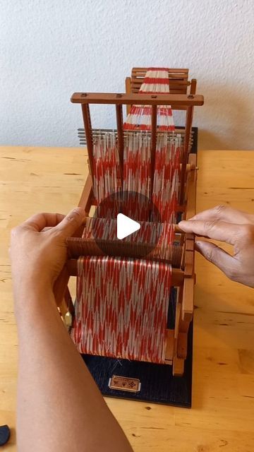 Vincent on Instagram: "This is a miniature kasuri (Japanese dye resist techniques) warping loom.

It is not a weaving loom, because there's no shedding mechanism. It's to used to re arrange the position of the tie-dyed patterns.

It combines several kasuri warping tools, that can also  purchased separately, in their usual sizes. Like the drums.

So, with this tool, a simple striped pattern can be raised and lowered to create new patterns.  There are so many possibilities. 

This pattern is called yagasuri. 矢絣 It is a symbol of determination, showing the feathered ends of arrows flying in straight direction. 

It features 2 bamboo reeds with very high dentage which is perfect for silk yarns.

Despite its size, it is a functional kasuri warping loom.

Next, I will share my kasuri yarn collec Japanese Weaving Pattern, The Drums, Weaving Loom, Silk Yarn, Loom Weaving, Tie Dyed, Loom, Drums, Weaving