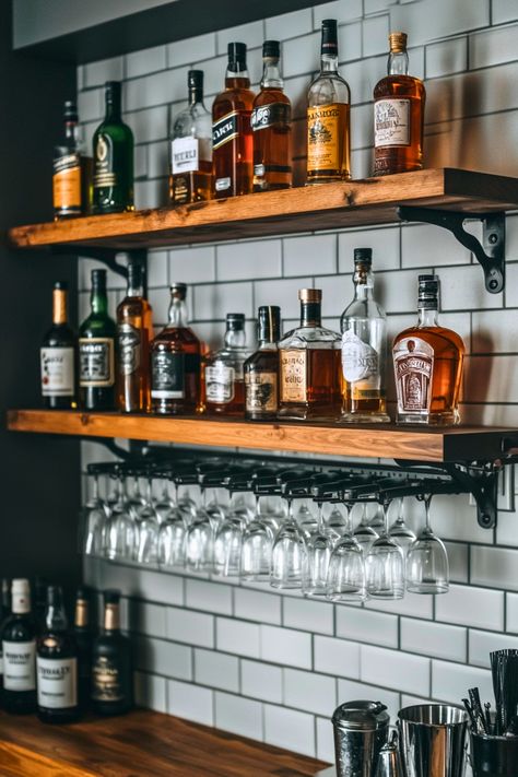 Looking for a stylish yet functional bar shelf idea? Wall-mounted bar shelves with hooks and racks are perfect for keeping your bar tools and glassware organized. I love how these units blend practicality with style, making them ideal for small home bar setups or even tiny home bars. Add one to your living room or kitchen and see how it transforms the space. Ready to organize and impress? Apartment Wet Bar Ideas, Mini Bar On Wall, Bar Wine Rack Design, Behind Bar Shelving, Home Bar Shelf Ideas, Ikea Dry Bar Ideas, Bar Nook Ideas Small Spaces, Bar Shelf Ideas For Home, Wet Bar Floating Shelves