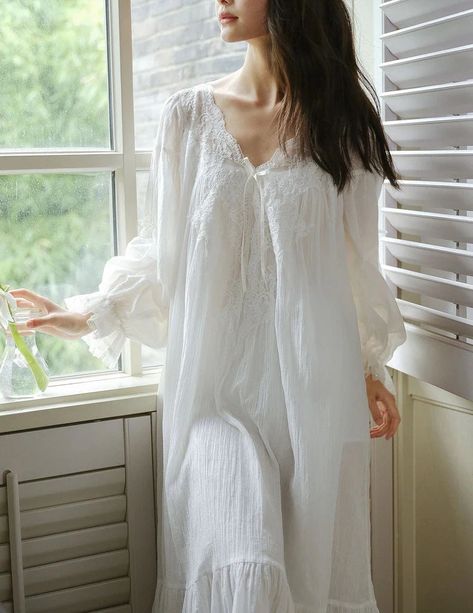 Are you looking for a high-quality, beautiful piece of sleepwear? Look no further than the Women Fairy Pure Cotton Puff Sleeve Robe Double Layers Long Night Dress. Don't miss out on our amazing collection of nightgowns! Not only are they comfortable and stylish, but they make a perfect gift for your special someone. Get yours today and enjoy the best sleep ever! #nightgowns #bedtimecomfort. Material: Pure Cotton Decoration: Lace Sleeve Length: Long Sleeve Parcel Include: 1PC Nightgown Vintage Princess Dress, Cotton Night Dress, Victorian Nightgown, Vestidos Retro, Edwardian Dress, Lace Dress Vintage, Vintage Nightgown, Blue Night, Vintage Princess