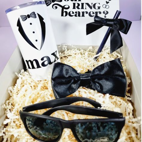 Prepare for the most adorable ring security officers at your wedding with our Ring Bearer Proposal Boxes! 🕶️💍 Tag a 2024 bride to be 👰‍♀️ . . . . @theknot @atlantaweddingextravaganza @weddingwire @weddingfavorites #bride2be #monochrome #ringbearer #ringsecurity #mrstobe #newlyengaged #2024bride #weddingfavors #bridalparty #teambride #weddingideas #shopsmall #weddinginspo #customtumbler #customgifts #weddingluxe #2024wedding #giftsforhim #newbride #monochromestyle Ring Bearer Gift Ideas, Ring Bearer Security, Blush Wedding Theme, Ring Bearer Proposal, Purple Flower Girls, Ring Bearer Gift, Groomsmen Proposal Gifts, 2024 Bride, Flower Girl Proposal