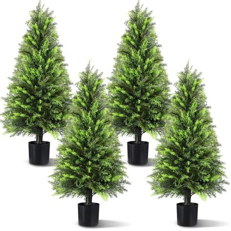 PRICES MAY VARY. Durable and UV Resistant: the 3ft artificial topiary trees outdoor made of quality plastic are UV resistant, which feature a blend of tender and dark green colors, truly imitating the real plants; The artificial trees with UV protection and exquisite craftsmanship, are durable Easy to Care: you will get 4 pieces artificial outdoor trees for porch requiring minimal care and requiring no watering, just an occasional wipe with a damp cloth to keep them fresh and vibrant, which are Large Porch Christmas Decor, Nutcracker Front Porch, Classy Christmas Outdoor Decor, Modern Christmas Porch Decor, Diy Topiary Trees Front Doors, Winter Porch Pots Diy, 4 Ft Christmas Tree Ideas, Christmas Tree On Front Porch, Christmas Decor Outside Porch