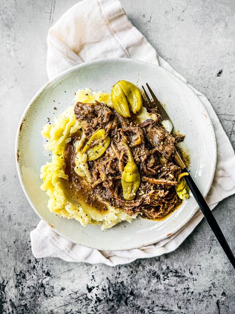 Made without seasoning packets, this Slow Cooker Mississippi Pot Roast is simple, tender, and downright delectable! #slowcooker #mississippipotroast #potroast #comfortfood Instant Pot Beef Bourguignon Recipe, Easy Beef Bourguignon, Red Wine Braised Short Ribs, Wine Braised Short Ribs, Slow Cooker Mississippi Pot Roast, Beef Bourguignon Recipe, Mississippi Pot Roast, Potted Beef, Slow Cooker Pulled Pork