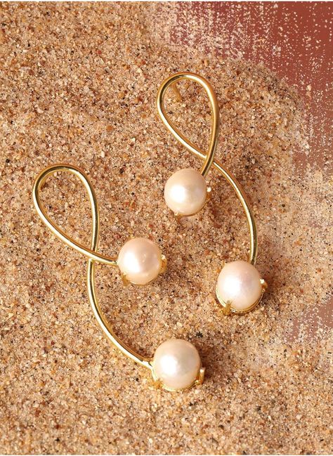 Beads Beaded Contemporary Drop Earrings - Gold-toned and white contemporary drop earrings, gold-plated, has beads beaded detailsSecured with a post and back closure Crafted from Brass with Artificial Beads embellishments, these drop earrings add a touch of elegance to any outfit.