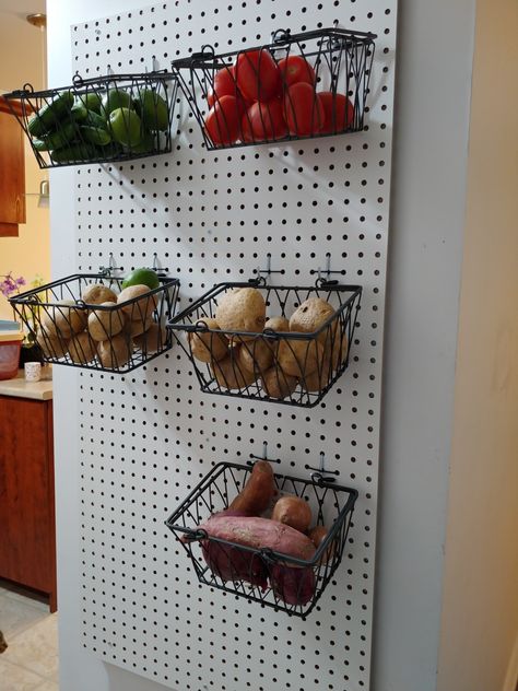 Transfered a blank wall with peg board and added baskets to have fruits and veggies in.This encouraged my son to grab something to eat. Peg Board Pantry, Kitchen Peg Boards, Peg Board Kitchen Wall, Kitchen Peg Board Ideas, Pantry Pegboard Ideas, Peg Board In Kitchen, Pegboard Spice Rack, Pegboard Kitchen Organization, Peg Board Kitchen