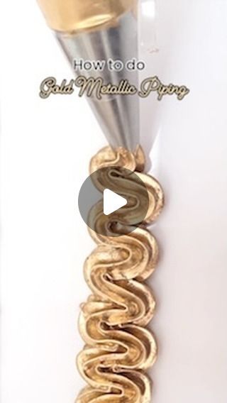 Lily Vanilli Bakery, London on Instagram: "Here’s how to create stunning gold shells, waves and rosettes.  We used an Ateco 18 tip, sweet sticks gold powder and extra virgin olive oil to achieve a smooth shiny finish.   #PipingTechniques #CakeDecoratingTips #CakeDesign #PipingHacks" Wave Piping Technique, How To Make Silver Icing, Gold Frosting Buttercream, Gold Decorated Cake, Gold And White Heart Cake, Greek Mythology Cake Ideas, How To Make Gold Icing, How To Make Gold Buttercream Frosting, Gold Icing How To Make