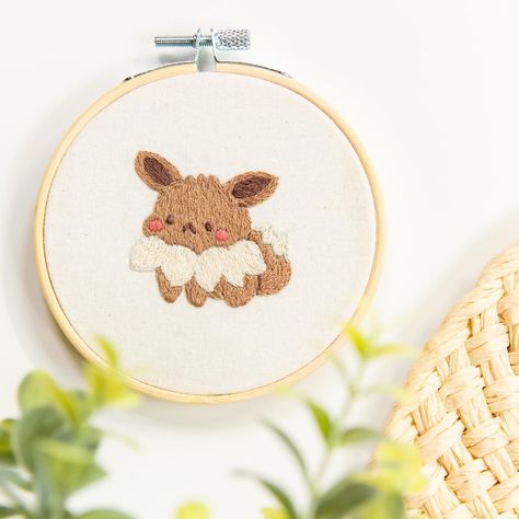 NEW PATTERN✨ Just added this adorable Pokémon Eevee embroidery pattern to the Etsy shop! Can’t wait to see your creations💕 #shopjamiephoto #jamiephotodiy #eeveelution #eevee #pokemon Pokemon Embroidery Designs, Pokemon Punch Needle, Pokemon Embroidery Pattern, Eevee Embroidery, Embroidery Pokemon, Pokemon Embroidery, Pokémon Eevee, Pokemon Eevee, Diy Photo