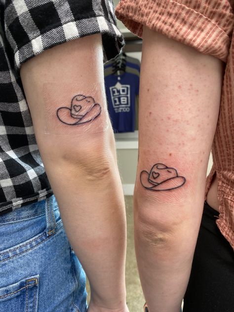 #tattoo #tattoos #matchingtattoos #bestfriendtattoos #countrygirl Duck With Cowboy Hat, Matching Western Tattoos, Small Tattoos Minimalist, Tattoos Cowboy, 3 Friend Tattoos, Husband Wife Tattoos, Cowboy Hat Tattoo, Tattoo Designs Unique, Tattoos Floral