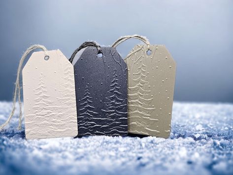 Simple embossed tags, elegantly portraying a snowy forest, are perfect for gift tags, winter scrapbooking, Christmas tags and more. The embossing is deep and clear on heavy pearlized/shimmer cardstock. An extra to/from tag is attached to the back for writing.  This peaceful scene can make your Christmas or Winter gift extra special! Embossed Tags, Handmade Christmas Gift Tags, Custom Christmas Gift Tags, Christmas Tags Handmade, Diy Christmas Tags, Holiday Gift Tags Printable, Xmas Gift Tags, Christmas Tree Gift Tags, Winter Scrapbooking