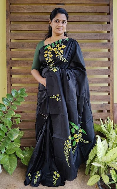 VEDA COLLECTIONS: 1. SILK SAREE Embroidered Art Silk Saree For Puja, Saree Painting Designs Simple, Saree Border Painting Designs, Tanjavore Paintings, Black Embroidered Art Silk Saree Fabric, Lotus Painting On Saree, Sari Painting, Painting Sarees, Lotus Painted Saree