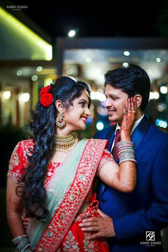 Klik pictures "Lalitha & Anand" album - Candid Couple Shot - Bride in a Red Sequinned Lehenga and Groom in a Navy Blue Suit. WeddingNet #weddingnet #indianwedding #indianbride #bride #bridal #sequinned #lehenga #bridallehenga #weddinglehenga #suit #green #gold #red Marriage Photoshoot, Wedding Photography India, शादी की तस्वीरें, Indian Bride Poses, Indian Bride Photography Poses, Indian Wedding Poses, Indian Wedding Photography Couples, Engagement Photography Poses, Wedding Photoshoot Props