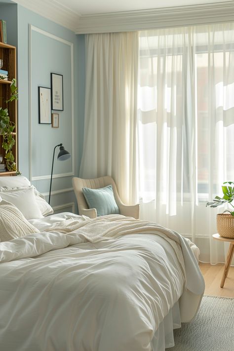 Create Your Serene Oasis: Tour This Cozy, Light-Filled Bedroom Retreat Relaxation Nook, Powder Blue Bedroom, Light Airy Bedroom, Bamboo Bedroom, Light Blue Cushions, Light Blue Bedroom, Pale Blue Walls, Unmade Bed, Home Sanctuary