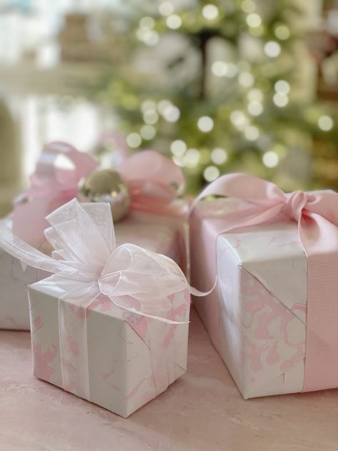 Today I am sharing how to wrap a gift with homemade wrapping paper and bows. I also decided to try a new color palette because I love pink! I have a confession to make. I use to wrap all of my gifts on Christmas Eve. I think I was so busy with baking for our … Professional Gift Ideas, Creative Corporate Gifts, 100 Year Old Home, Holiday Gift Tags Printable, Gift Wrapping Station, Wrapped Presents, Pink Christmas Ornaments, Colorful Gift Wrapping, Easy Diy Christmas Gifts