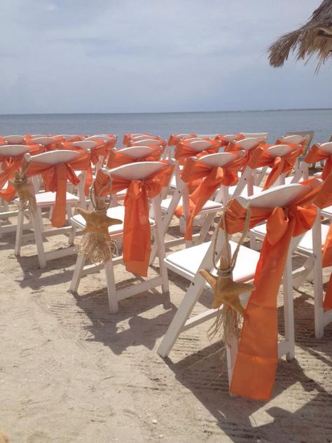 Orange beach wedding Blue And Orange Beach Wedding, Orange Beach Wedding, Cream Wedding Theme, Halloween Beach, Outdoor Beach Wedding, Orange Wedding Themes, Blue Beach Wedding, Mums Wedding, Dream Beach Wedding