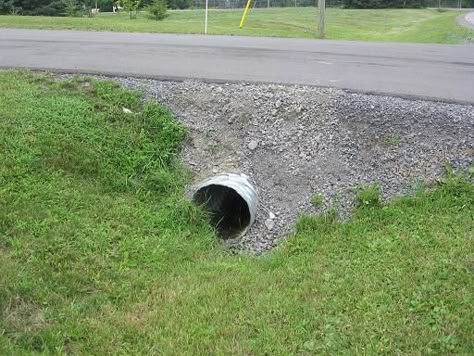 What is the best way to stop the crushed stone on driveway from falling into ditch above the culvert? The driveway is paved, but the stone u... Driveway Culvert Landscaping Ideas, Culvert Ideas Driveways Drainage Ditch, Driveway Culvert Retaining Walls, Culvert Retaining Wall, Driveway Culvert Ideas, Culvert Retaining Wall Driveways, Culvert Landscaping Ideas Driveway, Culvert Landscaping Ideas Drainage Ditch, Culvert Landscaping Ideas