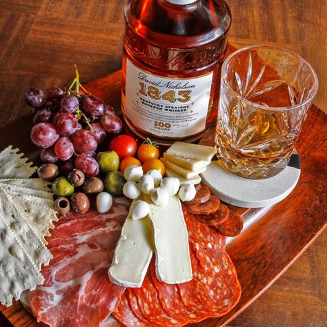 Who doesn't love a charcuterie board? Meat, cheese, tasty accompaniments like olives and crackers — what more could you need? Well … you could add a side of bourbon. While charcuterie boards are quite often paired with favorite wines, if you’re a whiskey fan, you may be wondering how you can pair th Charcuterie Board Meats, Wheated Bourbon, Christmas Cookie Cake, Bourbon Tasting, Rye Bourbon, Chocolate Bourbon, A Charcuterie Board, Cheese Pairings, Chocolate Fruit