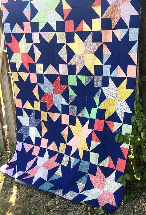 Stargazer Quilt Star Quilt Ideas, Ribbon Star Quilt, Ribbon Star, Pastel Prints, Quilting Digest, Layer Cake Quilts, Half Square Triangle Quilts, Yellow Star, Cozy Quilts