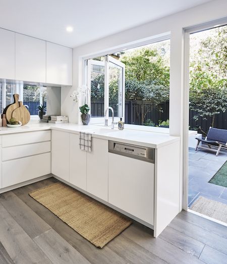 Built in the 1980’s, this inner-city Sydney townhouse showed many hallmarks of the era before The Designory (formerly… Kitchen With Side Door To Outside, Outdoor Kitchen And Laundry Area, Bi Fold Windows Kitchen, Bifold Kitchen Window, Kitchen Configuration Layout, Kitchen Window Bar, Kitchen Window Design, Balkon Decor, Window Opening