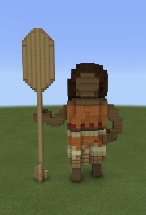 This is a picture of my Moana statue recreated in Minecraft! She is holding a boat oar and she is wearing a hula type shirt!! Disney Minecraft Builds, Disney Minecraft, Wicked Movie, Base Ideas, Fish Ocean, Hawaii Aloha, Minecraft World, Minecraft Tutorial, Geek Life