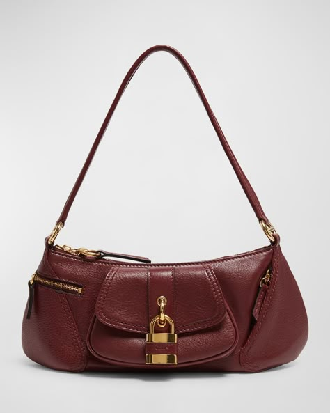 "Find CHLOÉ The 99 Shoulder Bag In Shiny Grained Calfskin on Editorialist. The Chloe The 99 shoulder bag is crafted from shiny grained calfskin leather. It features a shoulder strap, zip top closure, two zip pockets, and one flap pocket on the exterior, and one slip pocket on the interior. The bag is lined with cotton/linen and measures approximately 5.1\"H x 14.1\"W x 3.9\"D. It is made in Italy." Bag Flap Design, Chloe Bag Aesthetic, Cute Designer Bags, Chloe Clothes, Bags With Pockets, Cute Shoulder Bags, Vintage Chloe, Vintage Designer Bags, Chloe Clothing