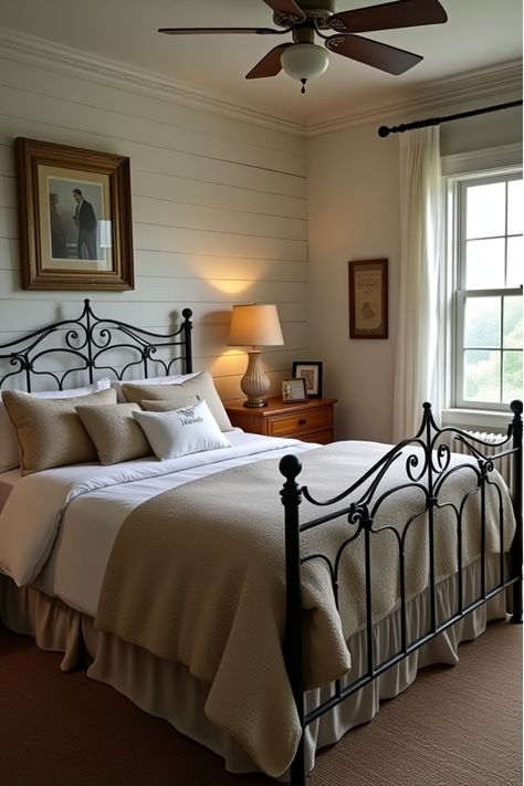 Rustic farmhouse bedroom with vintage quilts and wooden dresser Iron Beds Bedroom Decorating Ideas Master, Cottage Bedroom Iron Bed, Black Rot Iron Bedroom, Rail Bed Frame Bedroom Ideas, White Iron Beds Bedroom Decorating Ideas, Black Wrought Iron Bed Bedroom, Metal Bed Frame Bedroom Ideas Vintage, Iron Bed Frame Bedroom, Wrought Iron Bedroom Ideas